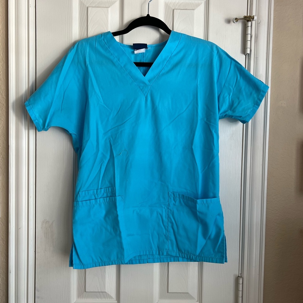 Light blue V-neck scrub top
